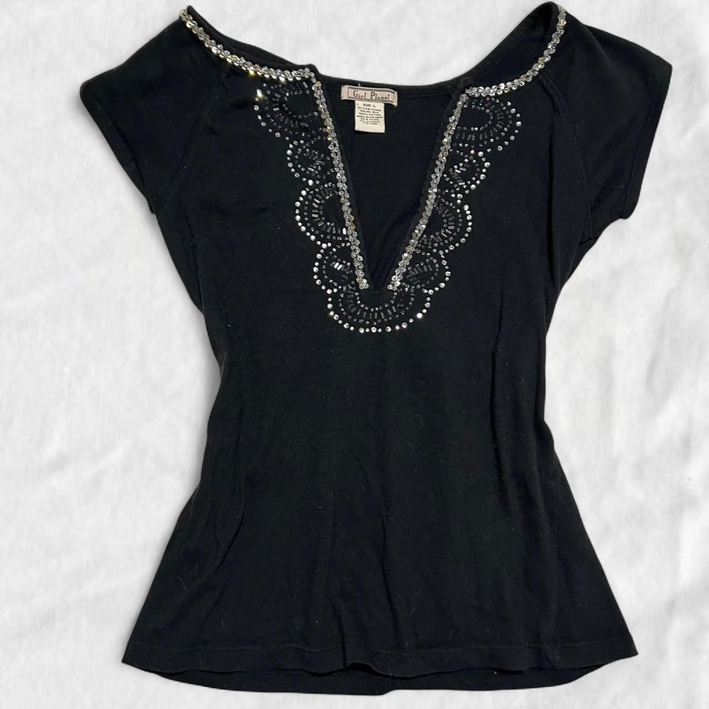 Black rhinestone embellished deep v-neck top by Girl Planet